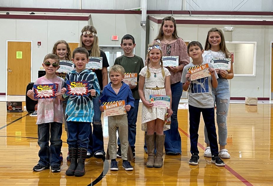 ​From left to right  Front row- Pre-K- Fisher McGee, K- Easton Vaught, 1st- Preston Webb, 2nd- Bella White, 3rd- Cason Willie,  Back row- 4th- Raegan Lee, 5th- Chloe Belknap, 6th- Hunter Hodges, 7th- Josie Brown, 8th- Hailey Branson